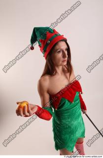 Veronika Elf Pose With Apple